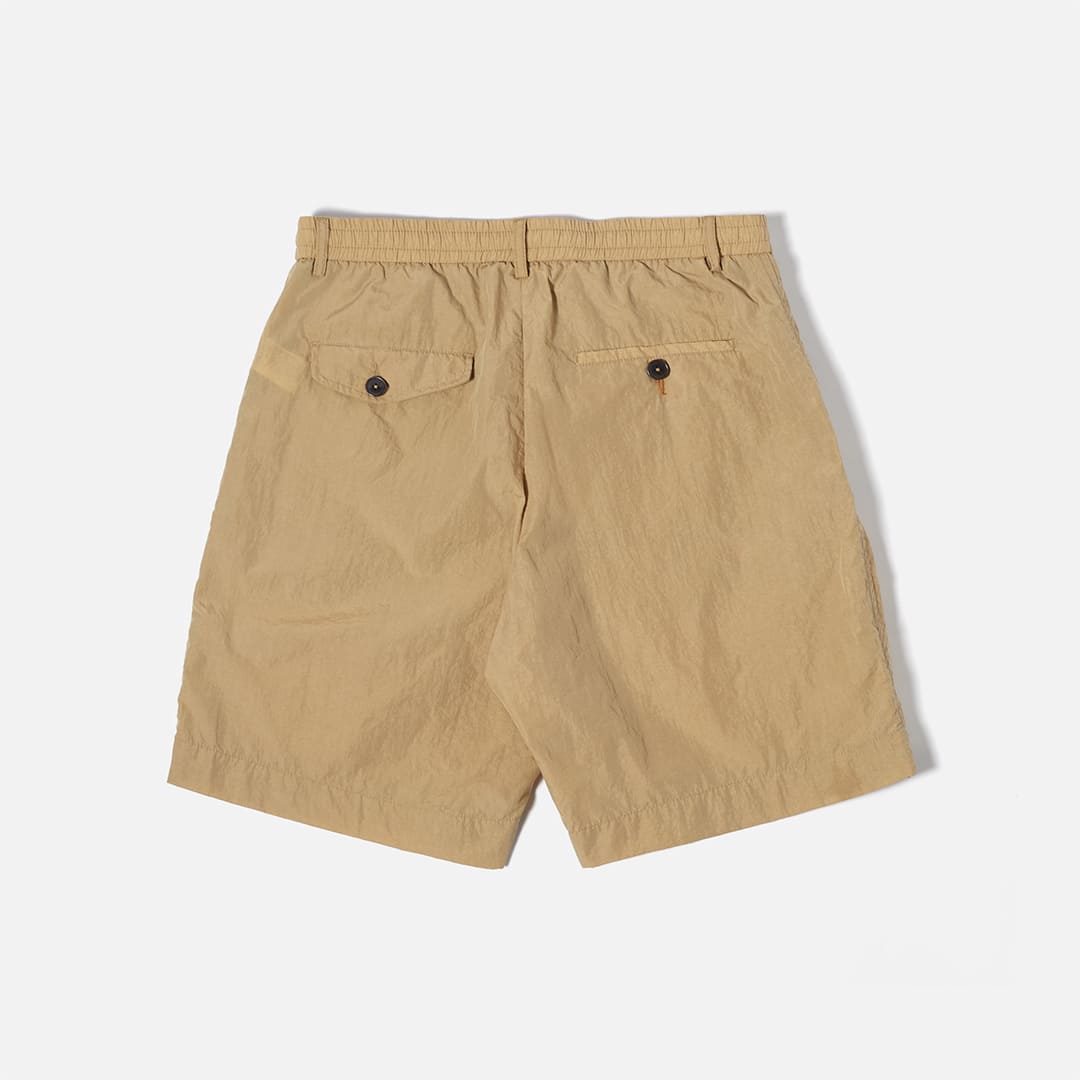 UNIVERSAL WORKS || RECYCLED NYLON PLEATED TRACK SHORT